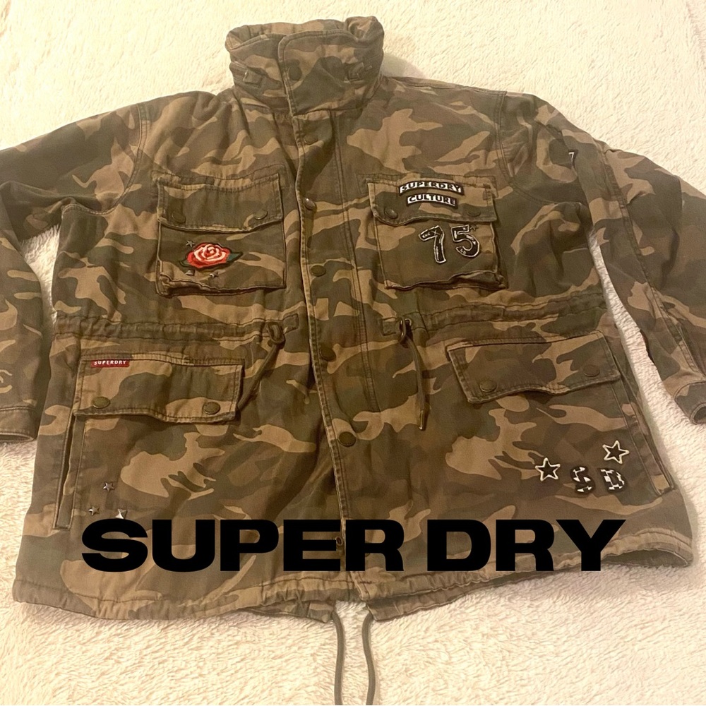 SUPERDRY Rookie Military Jacket in a camouflage pattern w/ studs & patches.